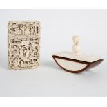 A Chinese carved ivory visiting card case with figures in buildings,