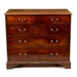 An early 19th Century mahogany chest of three long and two short drawers on bracket feet,