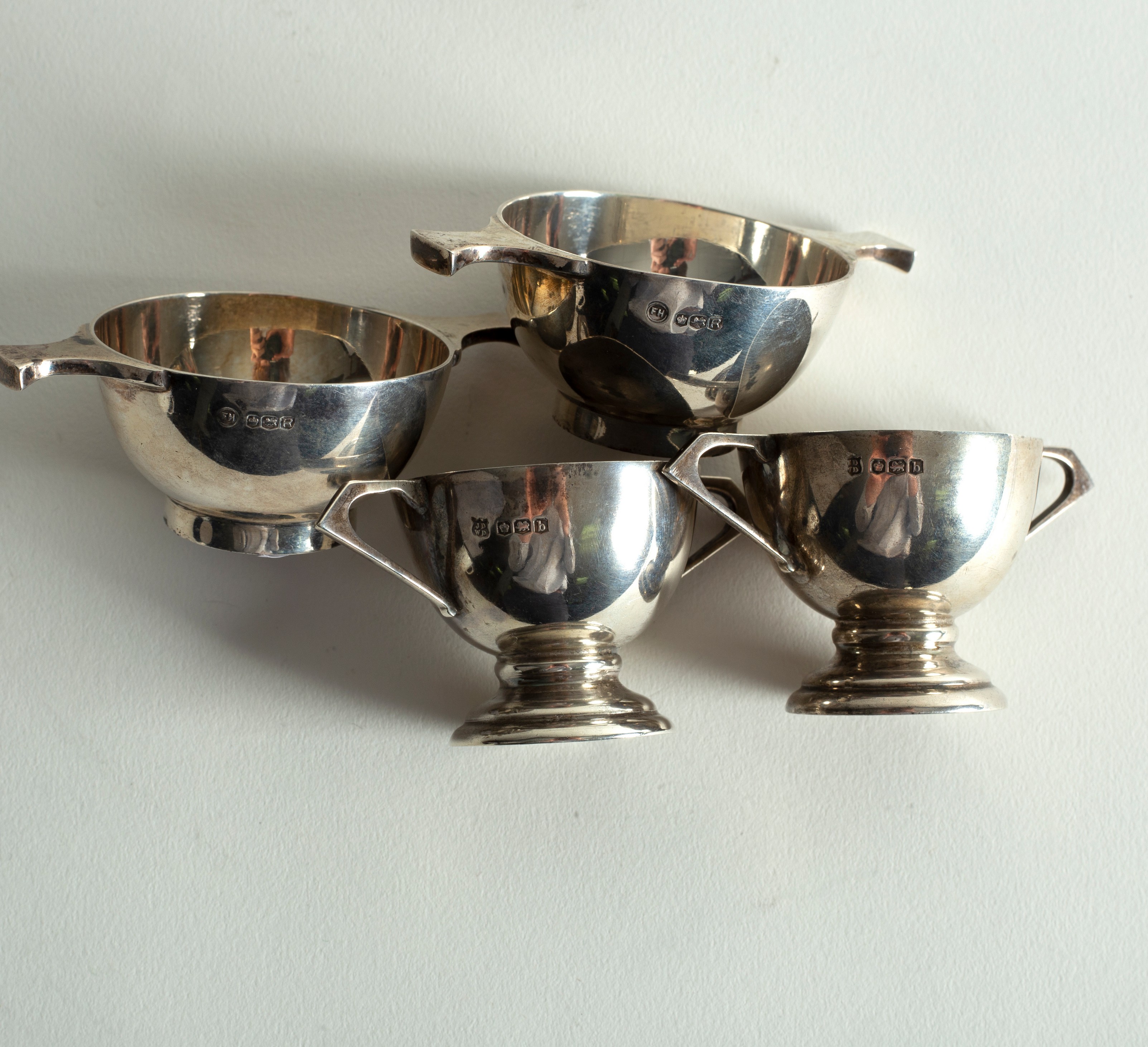 A pair of silver salts of miniature porringer form, two small trophy cups, - Image 2 of 2