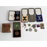 Sundry medals and medallions including a miniature World War I pair,