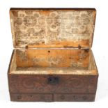 An early 18th Century leather and studwork dome top trunk,