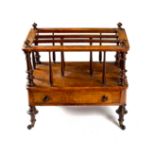 A Victorian walnut and boxwood strung Canterbury, fitted a drawer and on turned legs,