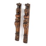 A pair of oak caryatid supports, 61.