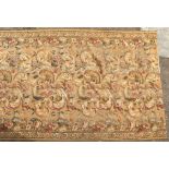 A 19th Century tapestry, basket of flowers, scrolls etc,