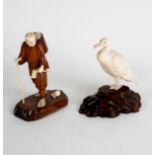 A Japanese carved ivory figure of a cormorant, Meiji period,