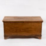 A pine blanket chest on bracket feet,