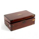 A Victorian mahogany brass bound writing box with fitted interior and drawer to the side,