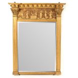 A Regency wall mirror, the frieze with dancing figures,