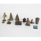 An embossed walking stick mount and various brass and other Indian figures