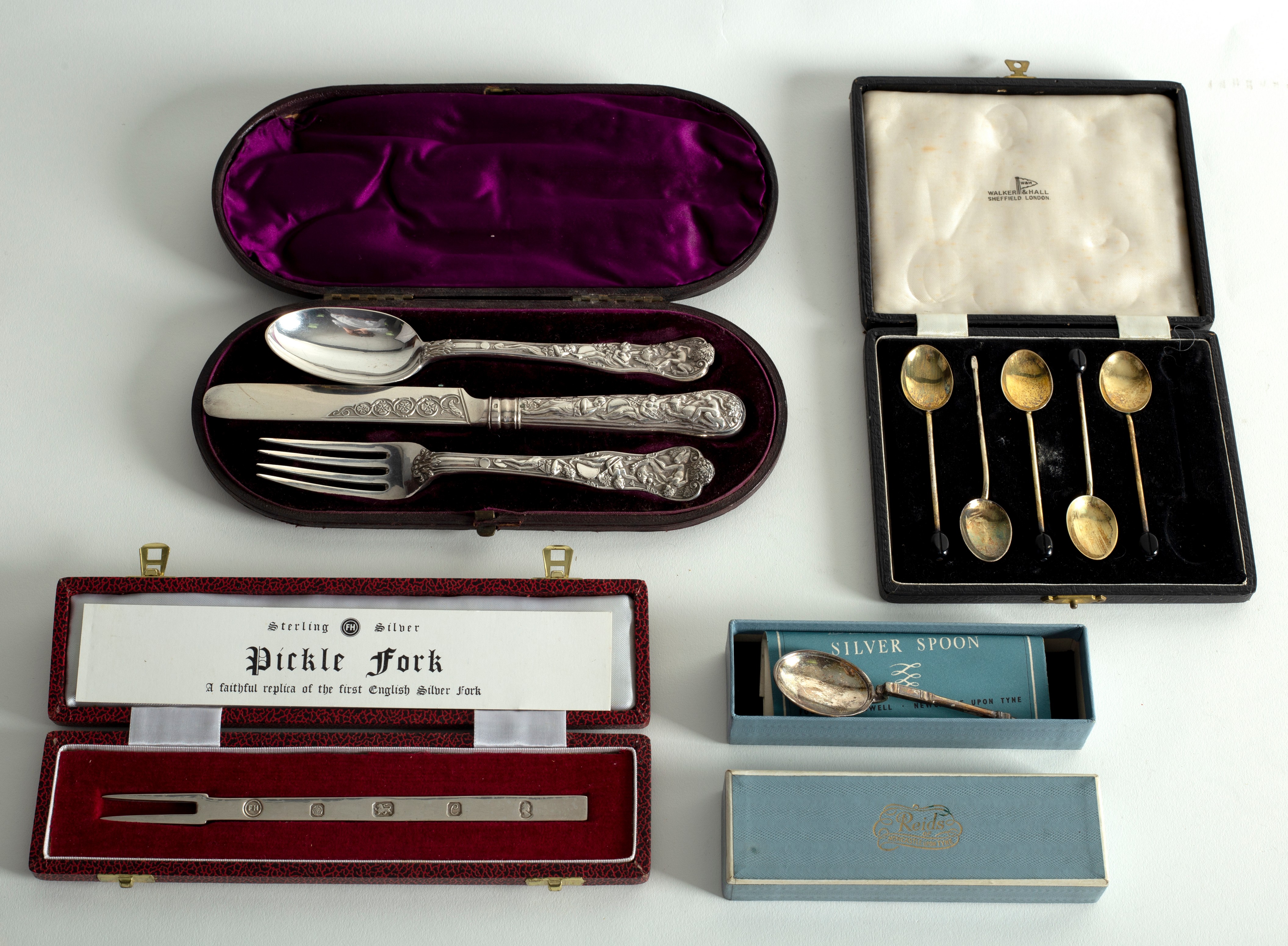 A Victorian silver three-piece Christening set of knife, fork and spoon, a cased silver pickle fork,