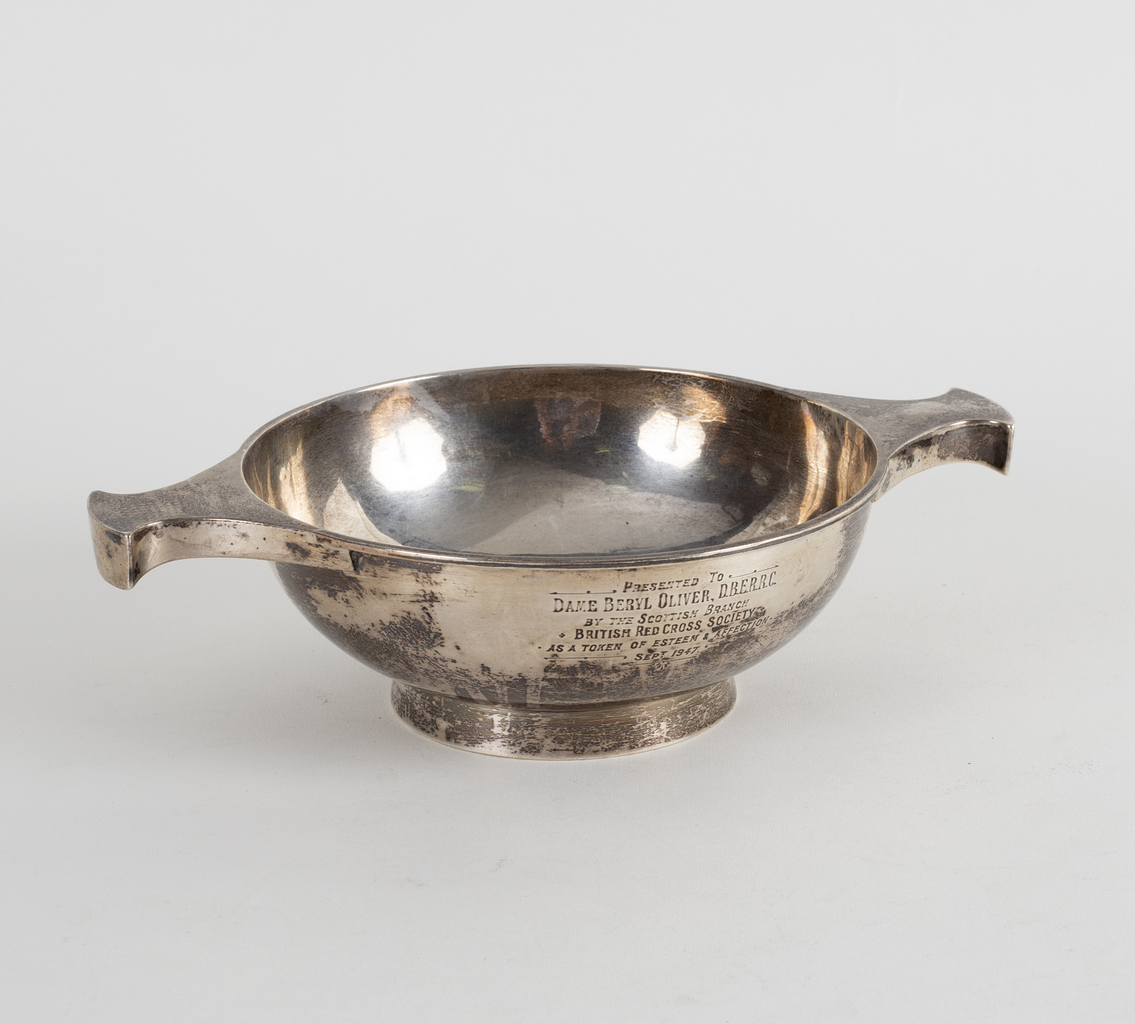 A large silver quaich, AE Jones, Birmingham 1937, with inscription to Dame Beryl Oliver....1947, 25.