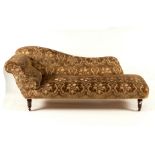 A late Victorian chaise longue on turned legs,