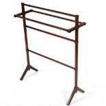 An Edwardian mahogany and inlaid towel rail,