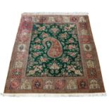 A Turkish silk rug,