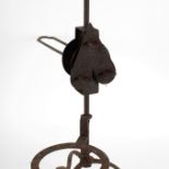 A wrought iron spit stand,