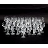 A part glass table service with double knopped stems of twenty-five pieces and six wine glasses