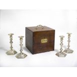 A matched set of four George I/II silver-gilt candlesticks,