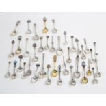 Thirty-eight silver souvenir teaspoons,