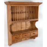 A Victorian pine hanging plate rack with three drawers,