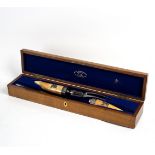 A Victorian ivory handled carving set with a steel blade, in a fitted oak box with Smith crest, 58.