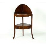 A Sheraton period mahogany bowfront corner washstand, the lower tier fitted a drawer,