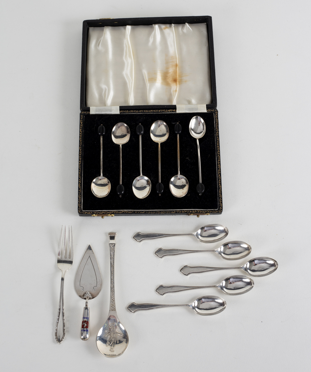 Six silver coffee spoons, SLO, Birmingham 1921, with bean finials, five silver coffee spoons,