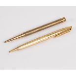 A 9ct gold propelling pencil, ER,