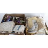 A box of lace edging, place mats, paper and other flower sprays, damask table linens etc.