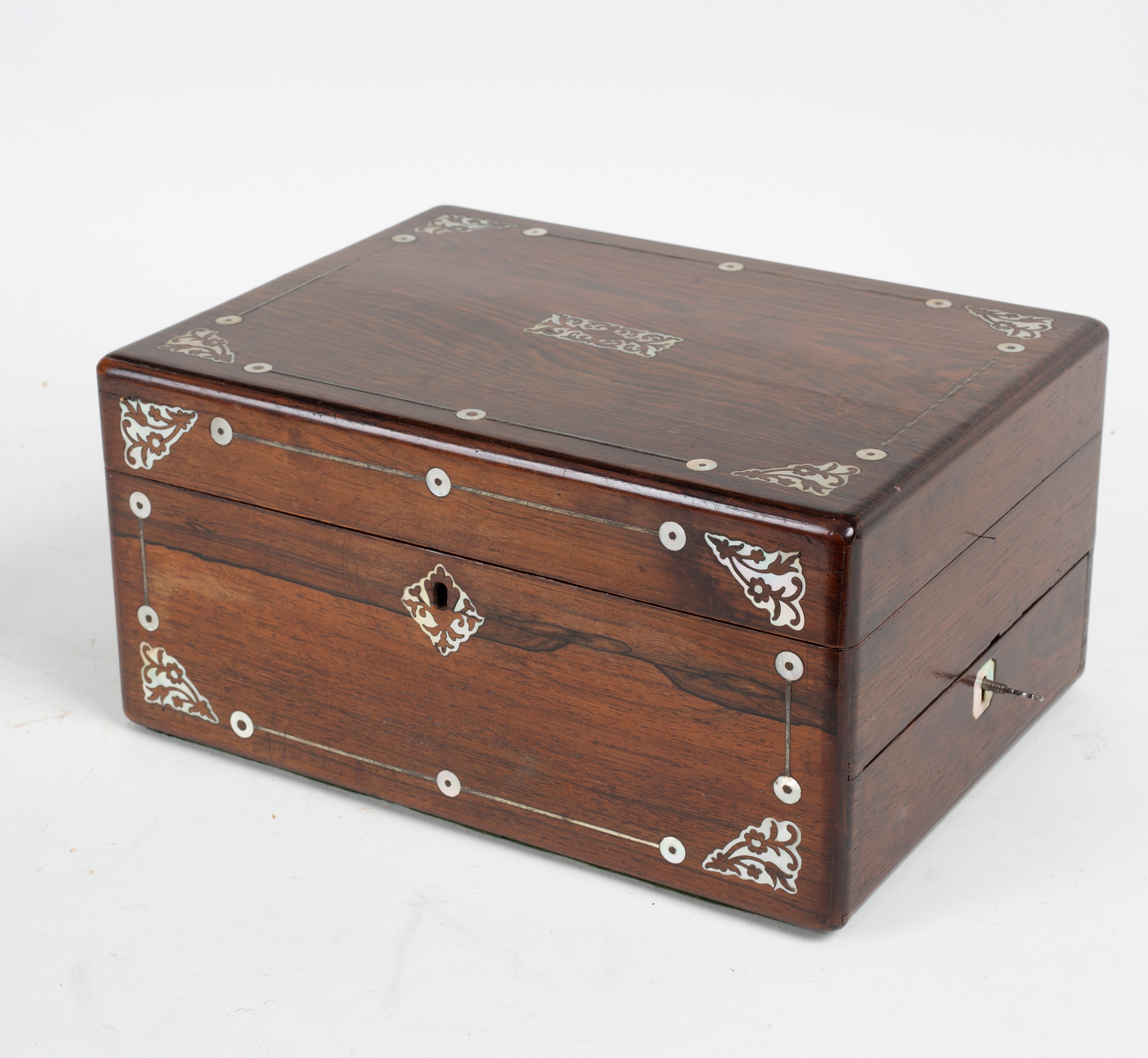 A Victorian rosewood workbox/jewel case, with mother-of-pearl inlay, 30.