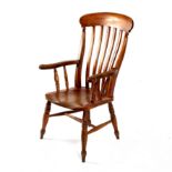 A beech and elm slat back kitchen chair,