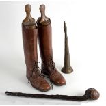A pair of brown leather riding boots with lace up fronts, a brass horn by R Smith,