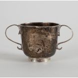 A silver two-handled toy cup, maker's mark only struck four times, crested, 4cm high,