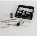 A three-piece silver cruet, Birmingham 1974, in a fitted case, an egg cup, caddy spoons, etc.