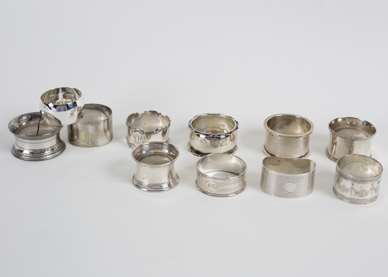 Eight silver napkin rings,