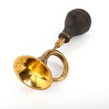 A brass car horn