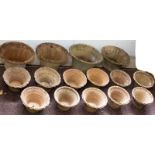 Fifteen terracotta flower pots, four approximately 32cm diameter,