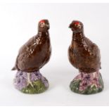 A pair of Beswick Royal Doulton whisky decanters modelled as grouse, for Matthew Gloag & Son Ltd.