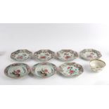 A collection of five famille rose octagonal plates, painted with peonies,