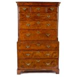 A George II walnut chest on chest, fitted six long and three short drawers, on bracket feet,