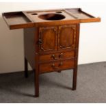 A Regency mahogany enclosed washstand, on square chamfered legs,