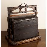 A Chinese metal bound three-tier food hamper, in a floral carved case with carry handle,