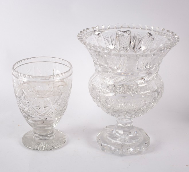 A heavy cut glass thistle-shaped vase on a circular base, 30.