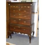 A Queen Anne oak chest on stand, circa 1710,