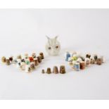 A collection of thirty-eight Royal Worcester and other thimbles,
