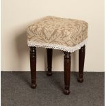 A Victorian upholstered stool on turned legs,