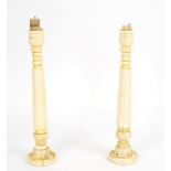A pair of Anglo-Indian ivory candlesticks made from parts of an 18th Century howdah,