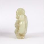 A Chinese pale celadon jade carving of a monkey with young, 18th/19th Century, 4.