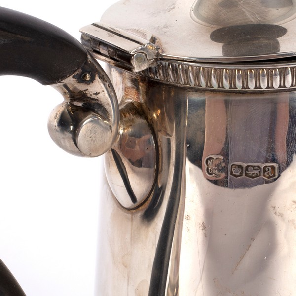 A silver hot water jug, Sheffield 1918, initialled H, with ebonised finial and handle, - Image 2 of 3