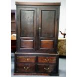 18th Century oak cupboard, the base fitted four short drawers,