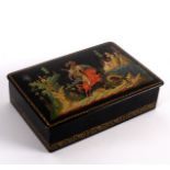 A Russian palekh box decorated by Aleksei Figurin (1910-1971) with a scene perhaps from 'The Little